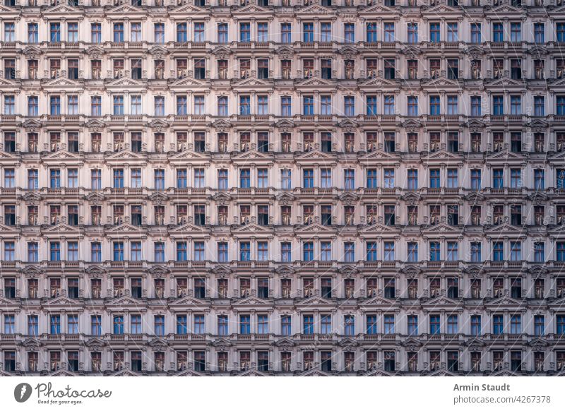 architectural pattern of an old luxury Berlin apartment building with stucco luxurious architecture berlin house facade historic weathered column pillar