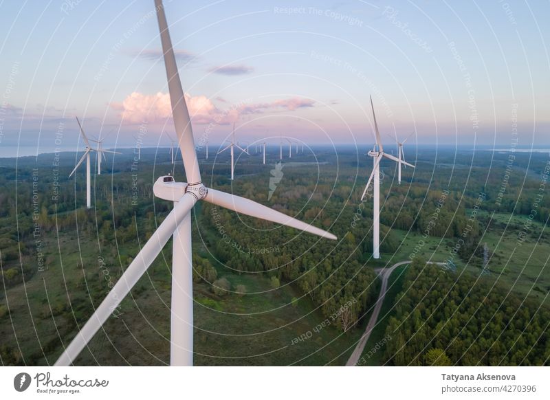 Wind turbines on sunset wind windmill electricity energy renewable environment generator alternative green power nature sky technology wind turbine landscape