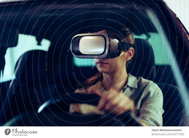 woman wearing 3d vr goggles, driving car in virtual space advanced safety vehicle automobile automotive black computer concept control cyber cyberspace digital