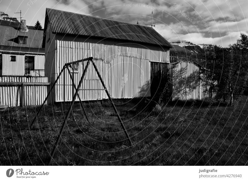 Iceland House (Residential Structure) Corrugated sheet iron Corrugated iron wall Corrugated-iron hut corrugated sheet metal facade Swing Light Shadow Meadow