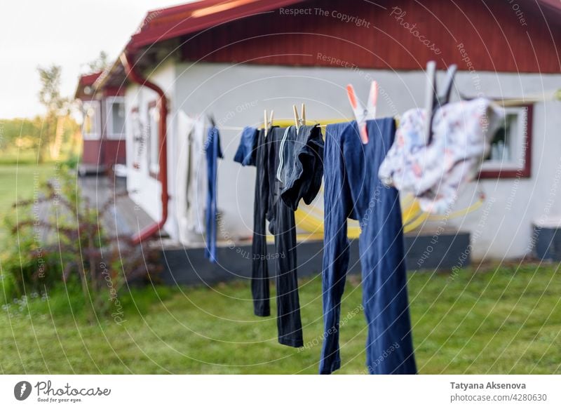 Laundry drying on the rope - a Royalty Free Stock Photo from Photocase