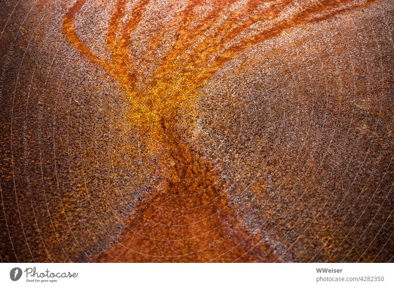 The abstract shapes and structures in rusty iron are reminiscent of... Iron Rust Abstract Orange golden Brown colored Colour Light Industry smelting works Old