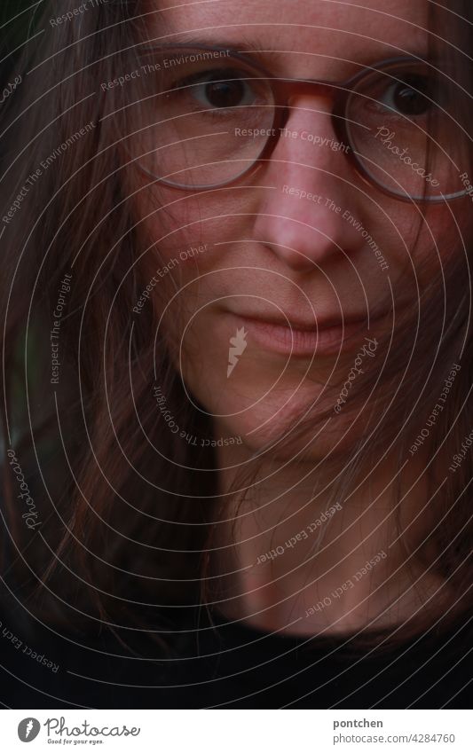 face of a middle aged woman with serious look Woman Profile Brunette gape Earnest Face hair Self-confident Demanding feminist Eyeglasses portrait