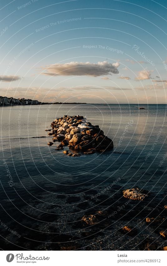 Sea stones! SEA Beach quay Evening Sunset warm evening light Ocean mood Summer sea ​​stones