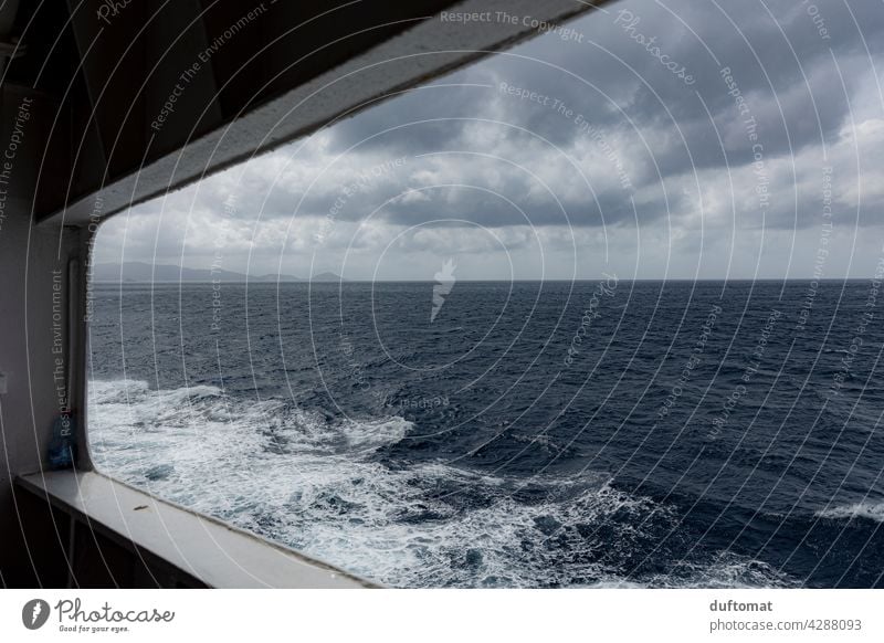 View of the sea through windows in the ship Ocean Mediterranean sea Sky Water Summer Horizon Blue Ferry Vacation & Travel coast Wanderlust Perspective Peephole