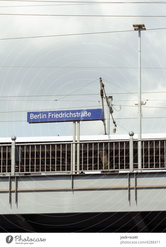 Berlin Friedrichstraße Platform Bridge Train station rail Cable Downtown Berlin Sky Clouds Worm's-eye view Name Capital city Architecture Germany Characters