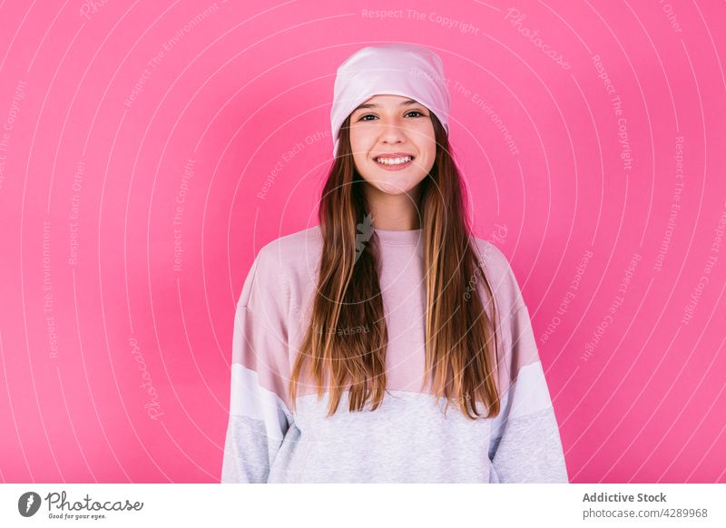 Charming teen in casual wear and headscarf smile woman cancer charming pleasant enjoy portrait adolescent girl sick chemotherapy millennial teenage glad