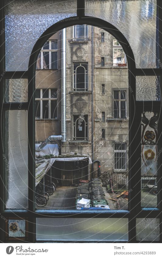 View through the old staircase window to the backyard Friedrichshain Window Backyard Berlin Old building unrefurbished Trzoska House (Residential Structure)