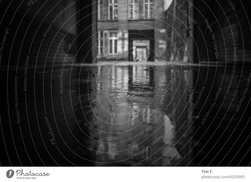 A wet backyard in Berlin Friedrichshain Backyard b/w Highway ramp (entrance) Black & white photo Architecture Town Exterior shot Deserted Downtown Capital city