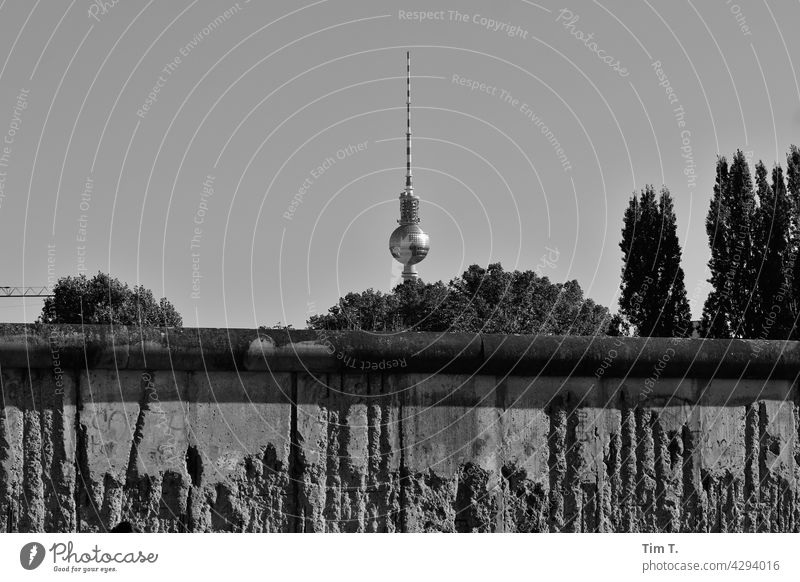 View over the Berlin Wall to the TV Tower Wall (barrier) The Wall b/w Television tower bernauer road Wedding Prenzlauer Berg Capital city Town Border Deserted