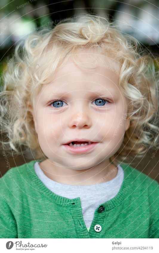 toddler boys with long curly hair