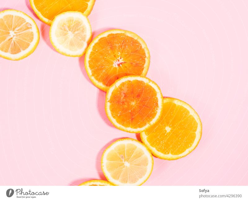 Colorful orange citrus slice fruit texture background on pastel pink fresh yellow white pastel color food pattern cut flatlay vitamin flat lay sweet organic