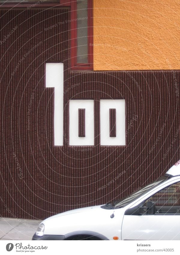 one hundred 100 House number Wall (building) House (Residential Structure) Brown Retro Stuttgart Architecture Digits and numbers Car Orange dogret white
