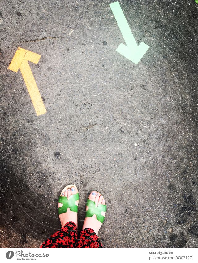 Disoriented feet Summer Arrow floor Street mark Decide Direction Change in direction Indecisive Orientation Road marking Turn off Right Left Navigation Clue