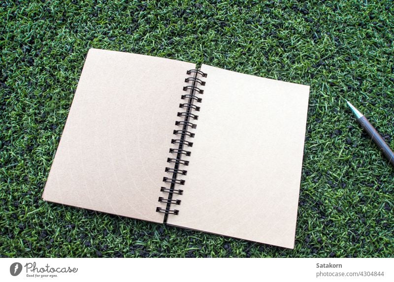 Open Blank Spiral Notebook On A White Background Stock Photo
