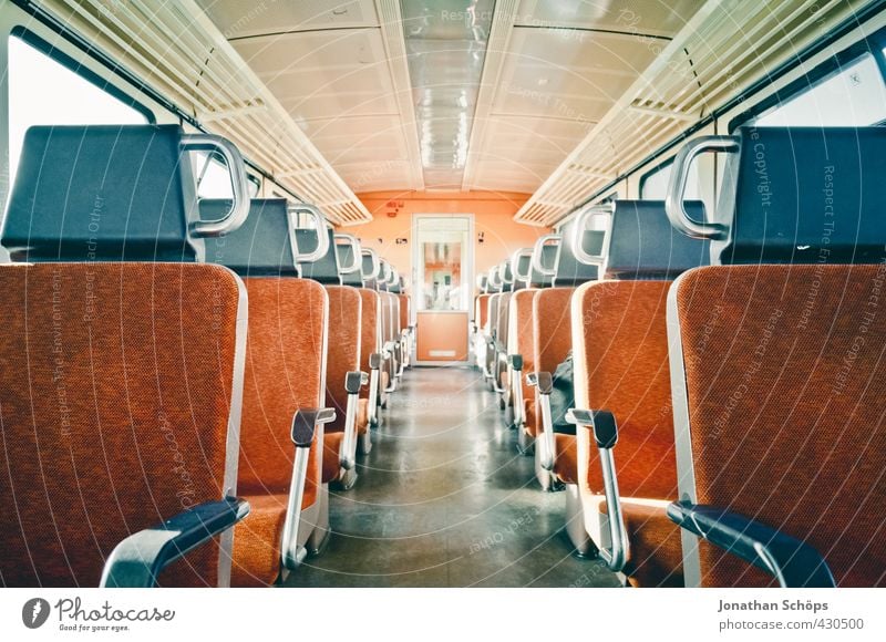 Middle aisle in an empty compartment on the train in the train Transport Means of transport Train travel Rail transport Passenger train Train compartment Modern