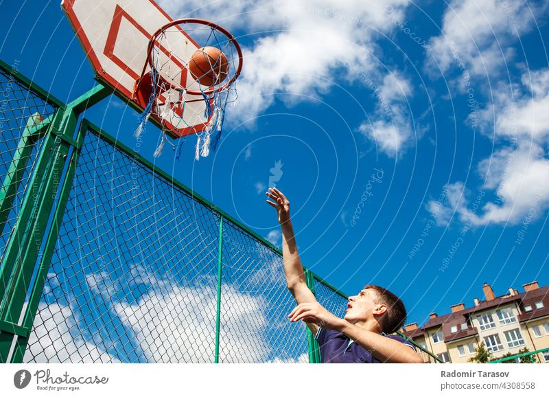 young man playing basketball player sport male athletic healthy exercise background lifestyle men action people athlete active competition white training game
