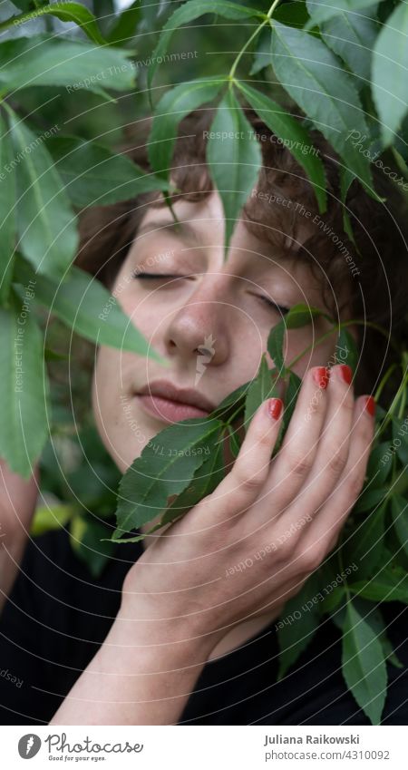 Woman connected with nature leaves Nature Green Colour photo Tree Exterior shot Plant Environment Leaf Deserted Day naturally Forest Sunlight Spring Growth