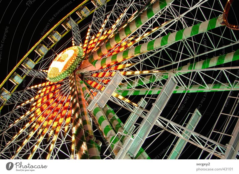 Ferris wheel by Night Leisure and hobbies Amusement Park Red Green Light Perspective Colour Multicoloured
