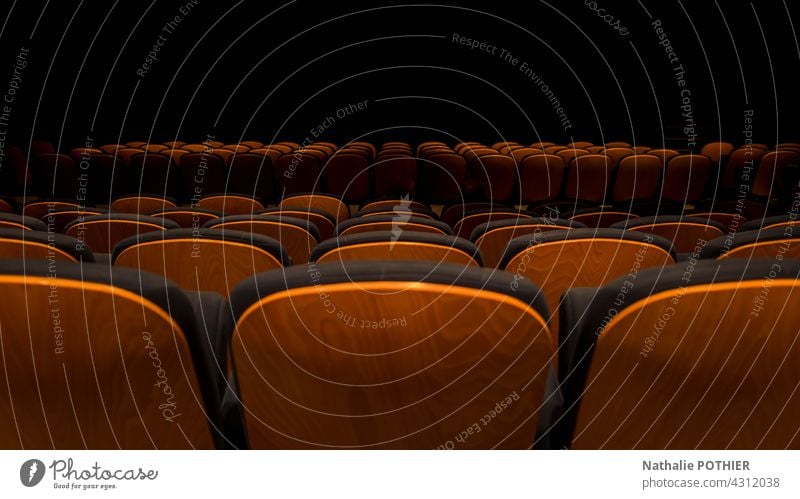 Seats lined up in a performance hall cinema film show seat armchair black Movie hall Leisure and hobbies Cinema Theatre Movie theater seat Dark Empty Armchair