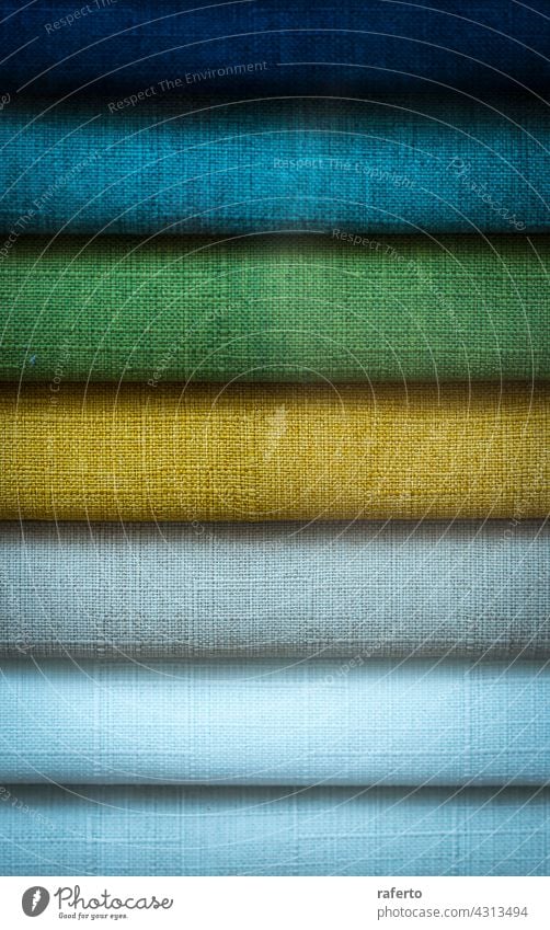 A Stack of some colored fabrics - a Royalty Free Stock Photo from Photocase