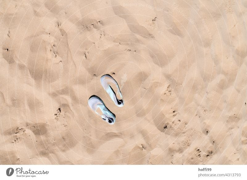 forgotten shoes in the sand of the dune Sandy beach Footwear Drought Forget Tracks traces in the sand Desert Footprint silty Buried duene Beach dune Barefoot