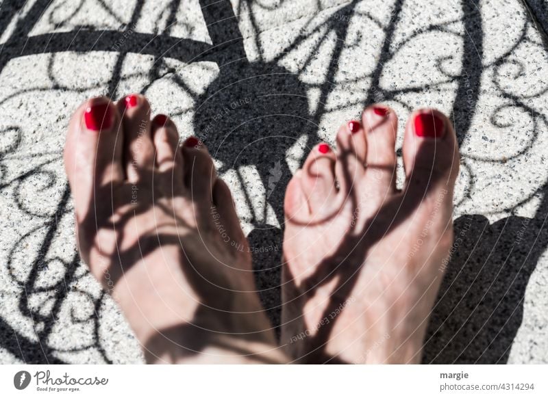 Show me your feet! Female feet under a table. The shadow looks like a tattoo Feet Feet together Barefoot Summer Exterior shot Woman Toes Nail polish Varnished