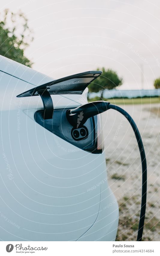 Charging electric car Electricity Energy Electrical equipment Technology Energy industry Connection electricity Cable Environment automobile Car technology