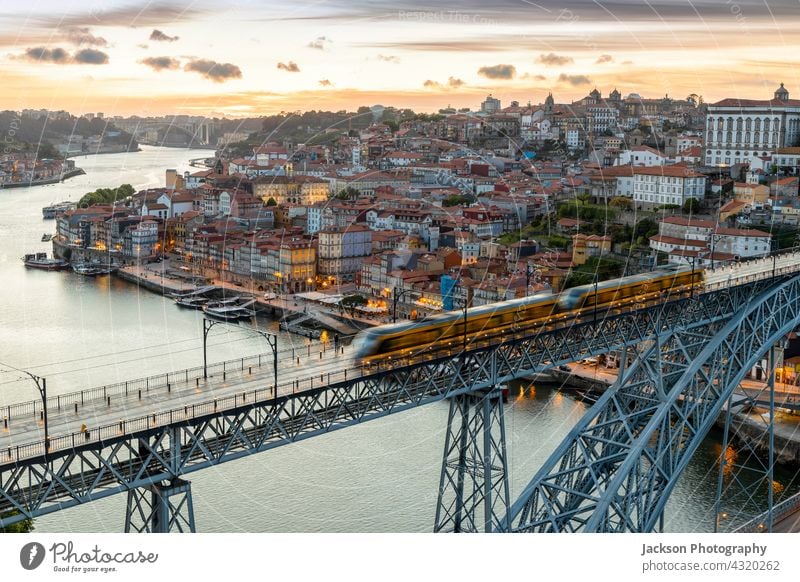 Skyline of the historic city of Porto with bridge by sunset, Portugal porto portugal ribeira night lights illuminated twilight sky nighttime beautiful