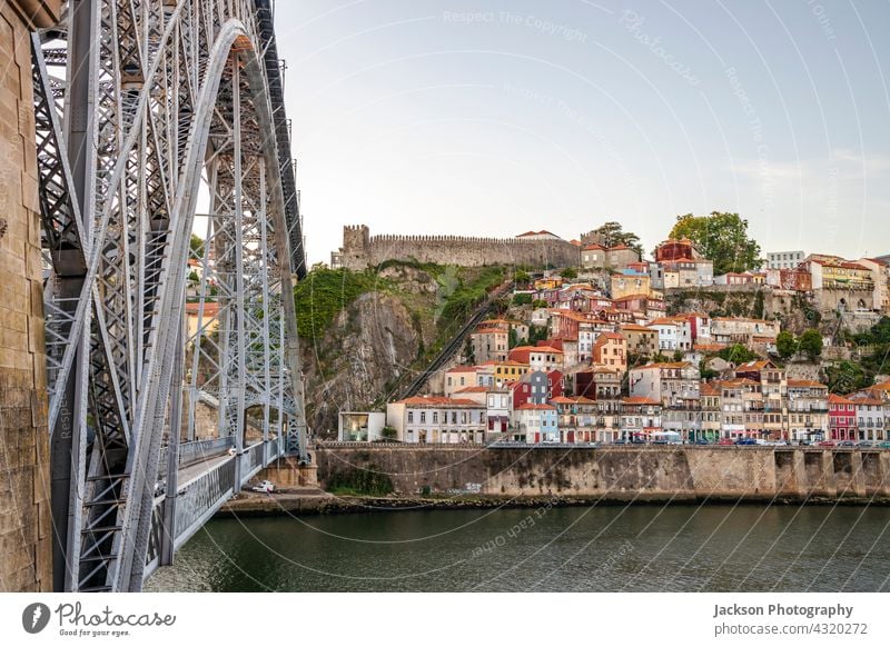 Cityscape of the historic city of Porto with famous bridge, Portugal porto sunset portugal skyline cityscape illuminated architecture attraction beautiful boats