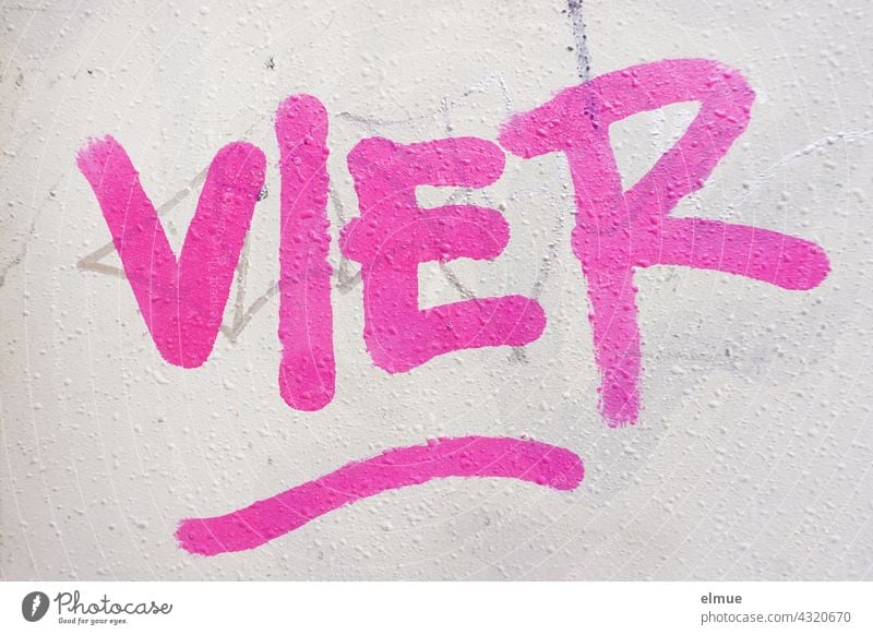 FOUR is written in pink on the grey wall / graffito four 4 Graffito Graffiti spray Colour Pink Printed letters Street art Daub Wall (building) Creativity