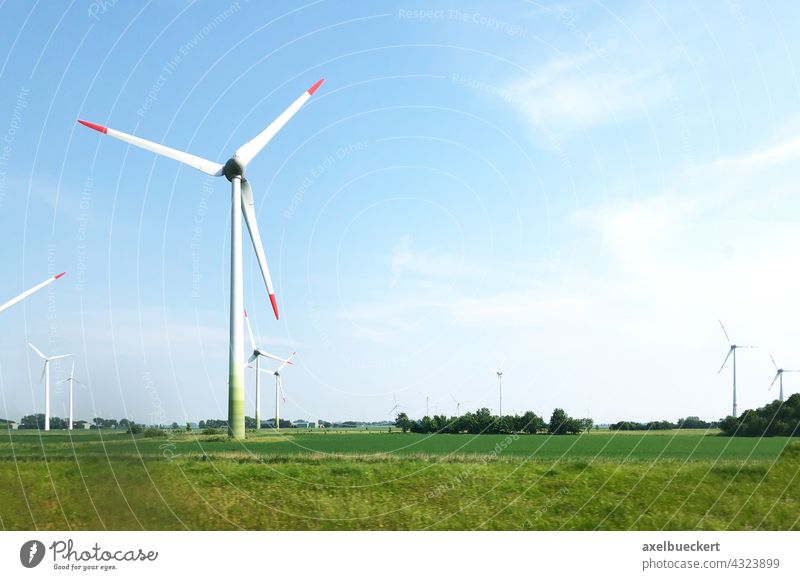 Wind turbines in the North German Plain Pinwheel wind farm wind power Wind energy plant Renewable energy Energy industry Electricity Environmental protection