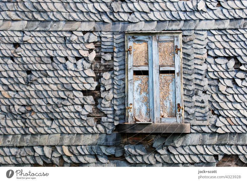 Shutter closed with crooked wobbly roof tiles Roofing tile House (Residential Structure) Architecture Structures and shapes pitched roof Background picture