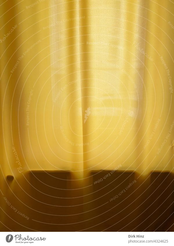 Radiator behind a yellow curtain Drape Yellow yellow background Folds Heating Heater overcast Cloth Folded cloth incurred Window curtain Concealed textile