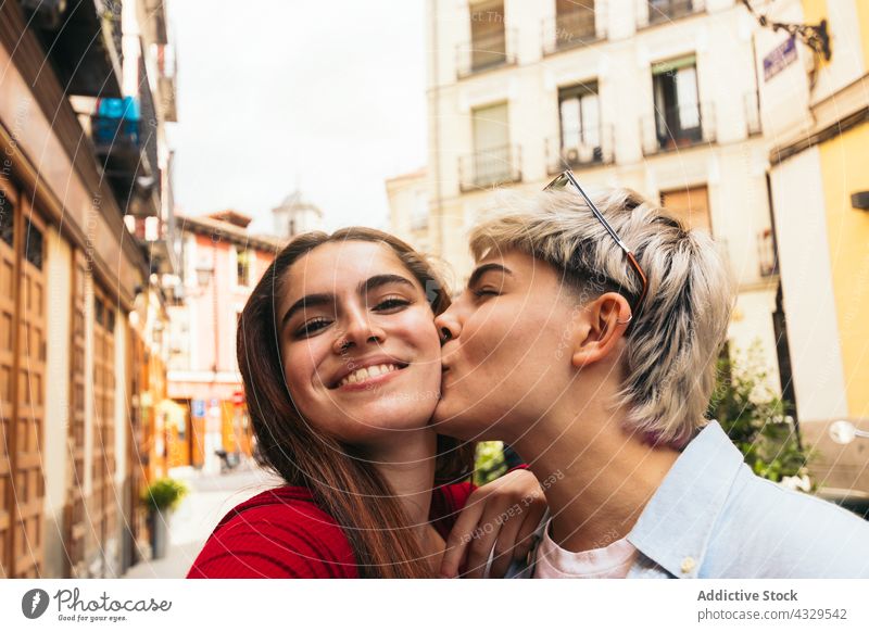 Selfie photo of two beauty girls kissing on the cheek happy selfie beautiful young fun people female friendship portrait lifestyle smile happiness cheerful