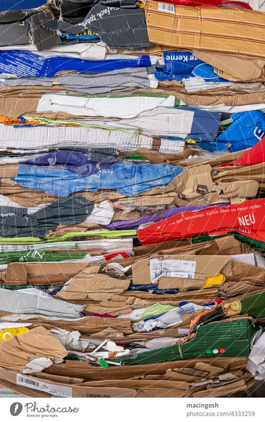 Compressed cardboard packaging Recycling Paper Cardboard Packaging Packaging material Deserted Colour photo variegated Many multicoloured Narrow Pressed Trash