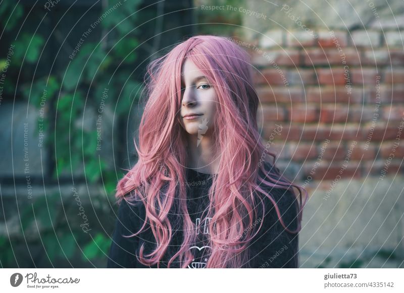 Portrait of a teenage girl with long pink hair Colour photo Girl Long-haired 13 - 18 years Hair and hairstyles Puberty Youth (Young adults) Feminine