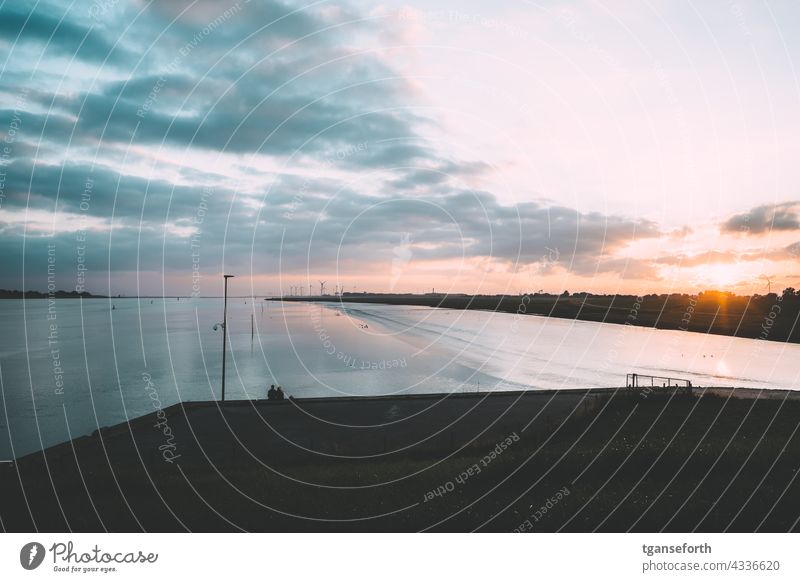 At the Ems barrage dollar Low water Low tide Sunset East Frisland coast Northern Germany Exterior shot Landscape Lower Saxony