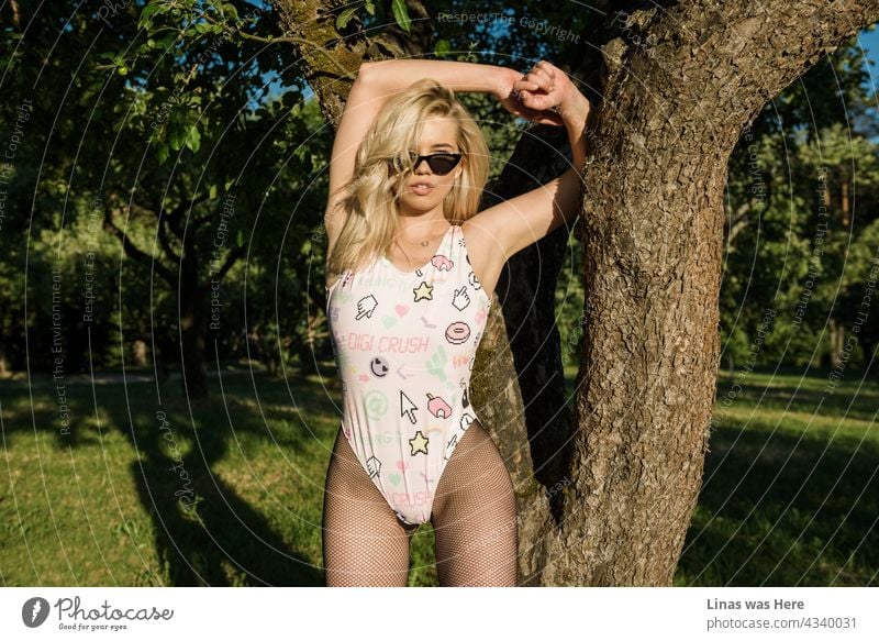 Blonde girls just wanna have fun. Wear their pink swimsuits. Have fun in the woods. Summer is super hot and so is our gorgeous model. blonde girl model test