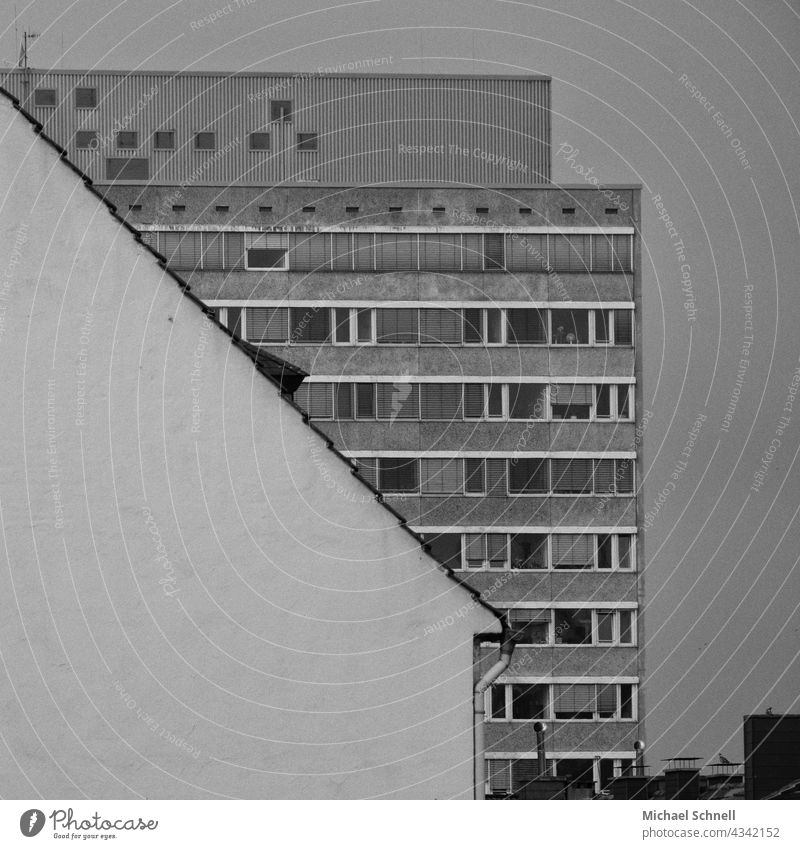 Residential triangle and high-rise rectangle houses differences disparate Triangle Rectangle Square Sharp-edged Gray grey in grey dwell labour