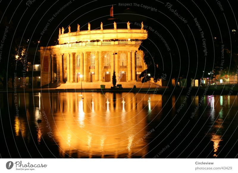 at night by road Stuttgart Night Building Long exposure Reflection Yellow Architecture night scene Gold Water