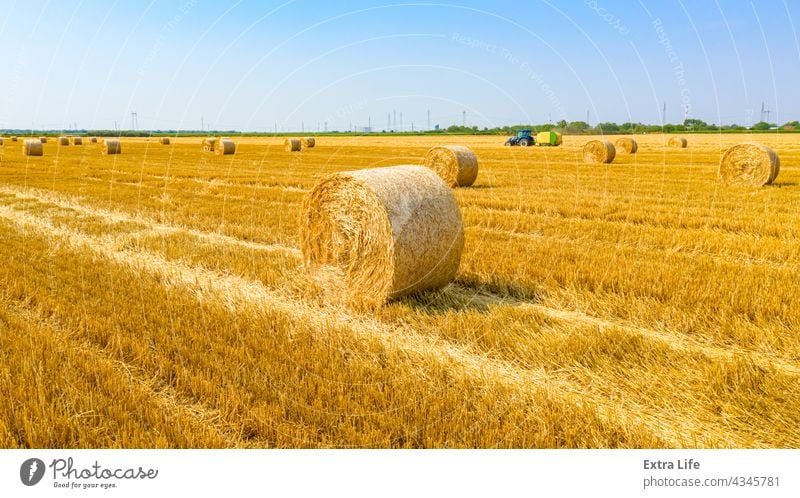 Aerial view of straw bales on farm fields Above Agricultural Agriculture Arable Bale Baler Baling Cereal Compact Country Crop Cultivated Cultivation Dolly Dry