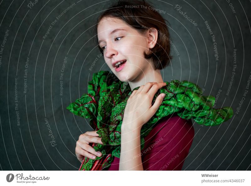 Such a chard is not only healthy and delicious, but also extraordinarily dressy Mangold Girl portrait Vegetable leaves vegetarian Fresh Delicious Smiling