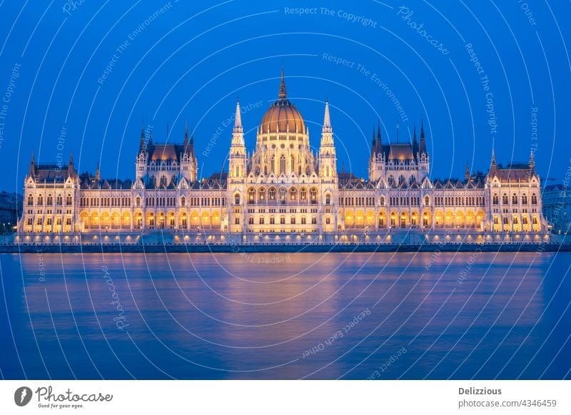 The famous parliament building in Budapest, Hungary during blue hour, illuminated hungary europa budapest city life city landscape architecture outdoors river