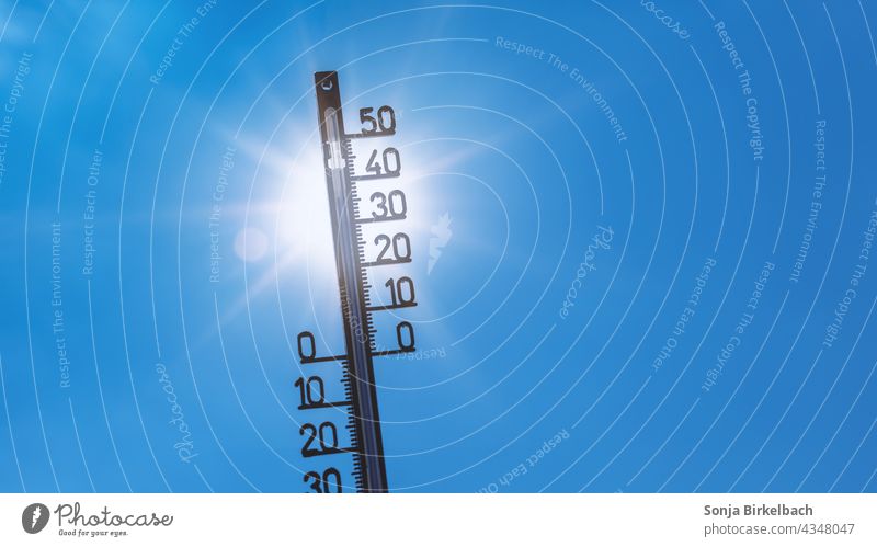 Symbolic image heat wave - thermometer in front of a blue sky with a bright sun ardor heat-free Summer Vacation & Travel Hot Warmth Weather Degree 30