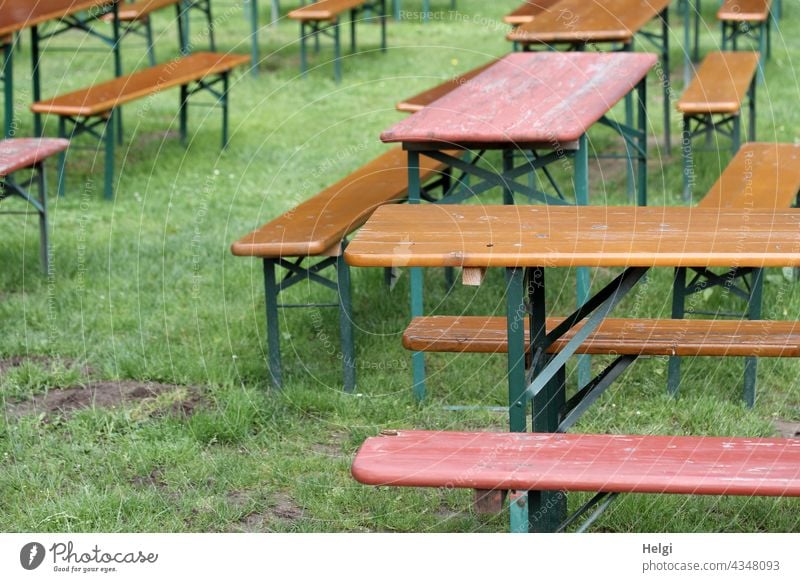 Spaces | empty tables and benches on a meadow in the beer garden with distance in Corona times Beer garden Table Bench Empty Meadow corona gap Deserted Closed