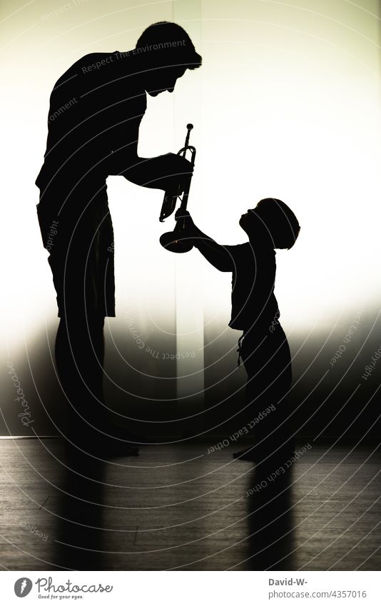 Father and child - Child rearing - Welfare dad Son Considerate Parenting Music tool Study Indicate Together Parents in common Love Shadow Shadow play