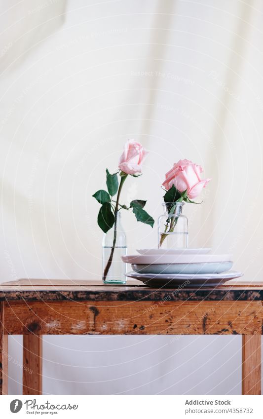 Pink natural roses on vase flower pink floral decoration bouquet glass blossom beauty nature white romantic romance summer color spring wooden surface table