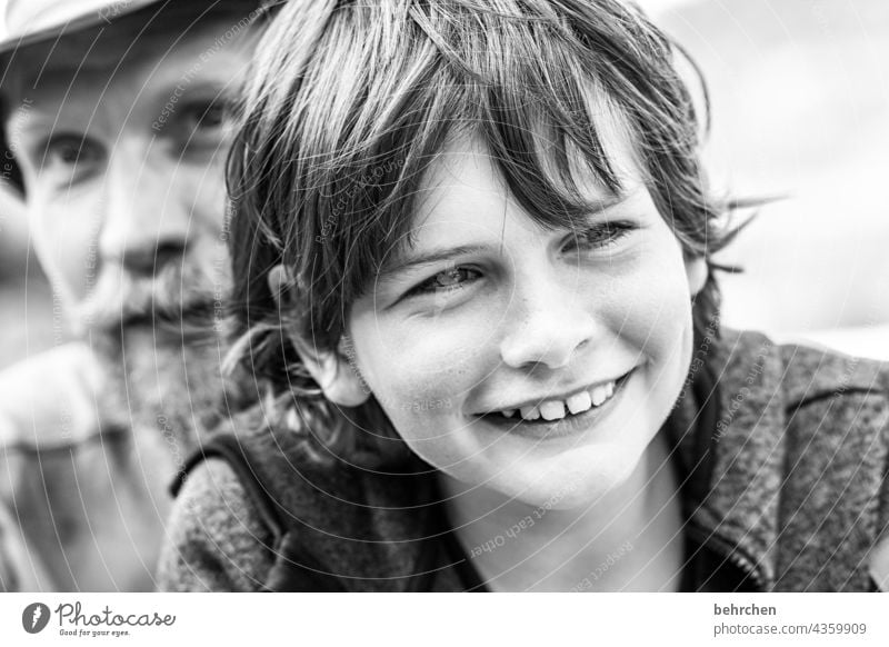 a laugh from you. makes my heart leap to the brim. and grasp happiness. cheerful Happiness Close-up Sunlight Face Happy Facial hair Child Boy (child) portrait