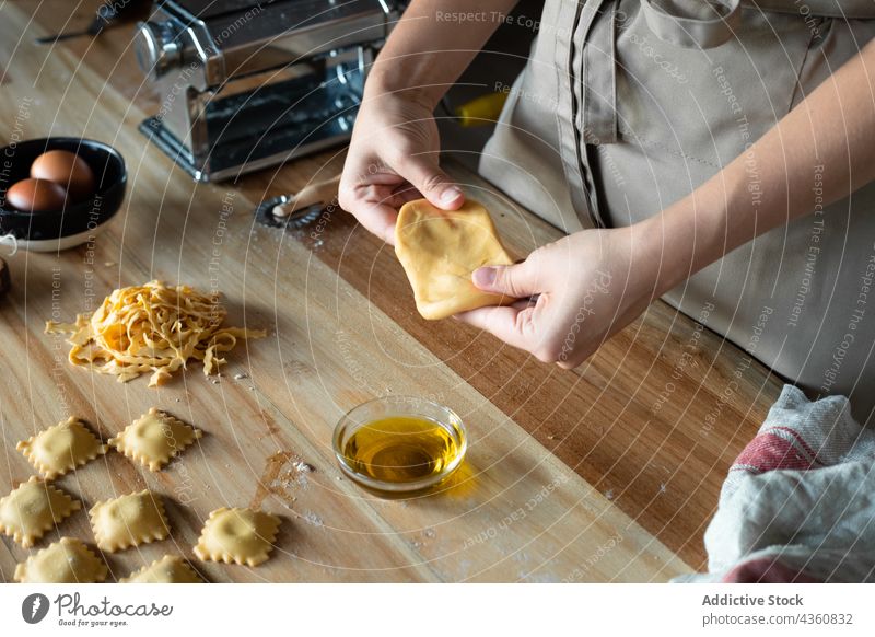 Anonymous Person Preparing Homemade Raviolis food cooking healthy table traditional wooden nutrition closeup pasta board chef cooked cuisine culinary culture